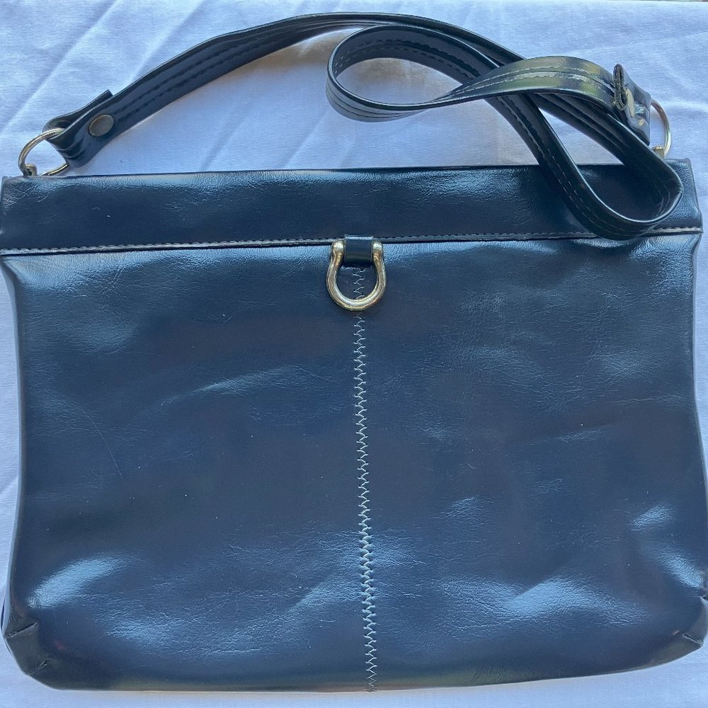 Navy blue magnetic clasp handbag